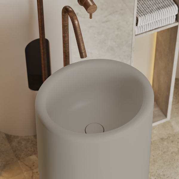 Vrijstaande waszuil gemaakt van solid surface in de kleur sahara clay